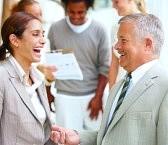 business people communicating in workplace by Benefits Plus:  Dental, Medical and More