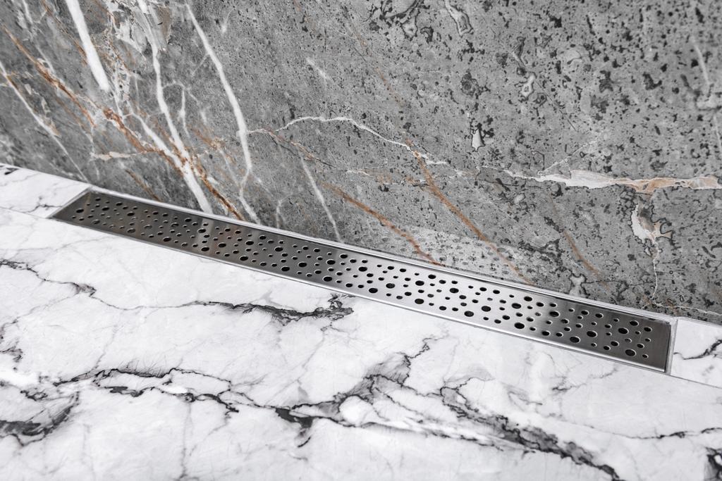 Stainless linear shower drain system